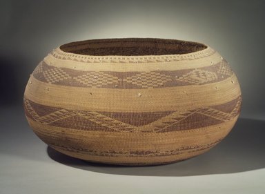 Jenny Hughes (Pomo). <em>Twined Dowry Basket</em>, late 19th century. Willow, sedge root, redbud bark, clamshell beads, glass beads, cotton string, 13 3/4 x 27 in. (34.9 x 68.6 cm). Brooklyn Museum, Museum Expedition 1907, Museum Collection Fund, 07.467.8305. Creative Commons-BY (Photo: Brooklyn Museum, 07.467.8305.jpg)