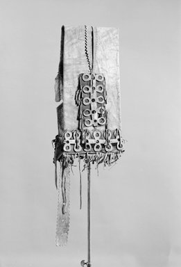 Possibly Effie and Montayo Alchesay. <em>Saddle Bag</em>, late 19th century. Hide, cotton, tin, 42 1/2 x 10 1/4in. (108 x 26cm). Brooklyn Museum, Museum Expedition 1907, Museum Collection Fund, 07.467.8459.2. Creative Commons-BY (Photo: Brooklyn Museum, 07.467.8459.2_view1_acetate_bw.jpg)