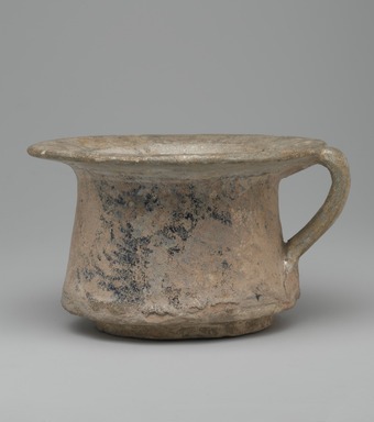  <em>Cup</em>, 13th century. Ceramic; fritware, painted in black and cobalt blue under a transparent glaze; heavy iridescence; rim and handle repaired, 4 x 6 7/8 in. (10.2 x 17.5 cm). Brooklyn Museum, Museum Collection Fund, 08.23. Creative Commons-BY (Photo: Brooklyn Museum, 08.23_side1_PS2.jpg)