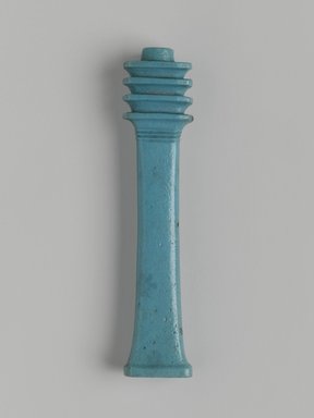  <em>Djed-Column Amulet</em>, 664-525 B.C.E. Faience, 3 3/4 x 13/16 x 1/2 in. (9.5 x 2.1 x 1.3 cm). Brooklyn Museum, Charles Edwin Wilbour Fund, 08.480.128. Creative Commons-BY (Photo: Brooklyn Museum, 08.480.128_front_PS1.jpg)