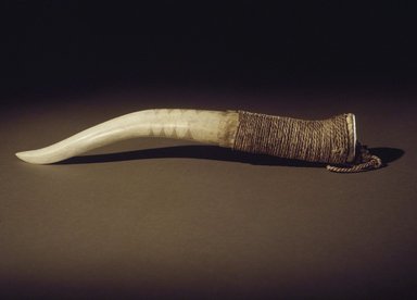William Benson (Pomo, 1862-1937). <em>Bear Doctor's Dagger</em>, early 20th century. Elk antler, hide, plant (milkweed) fiber, twine, pigment, 13 1/2 x 2 in. (34.3 x 5.1 cm). Brooklyn Museum, Museum Expedition 1908, Museum Collection Fund, 08.491.8668. Creative Commons-BY (Photo: Brooklyn Museum, 08.491.8668.jpg)