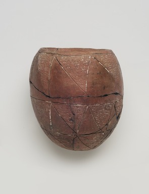  <em>Jar with Impressed and Incised Decoration</em>, ca. 3300–3100 B.C.E. Clay, paste, 5 1/16 x diam. of mouth 3 in. (12.8 x 7.6 cm). Brooklyn Museum, Charles Edwin Wilbour Fund, 09.889.445. Creative Commons-BY (Photo: Brooklyn Museum, 09.889.445_view02_PS11.jpg)