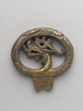  <em>Sword Pommel</em>, Circa 300 - 600 C.E. Gold plated bronze, 2 1/2 x 2 3/8 x 1/2 in. (6.4 x 6 x 1.3 cm). Brooklyn Museum, Museum Expedition 1909, Purchased with funds given by Thomas T. Barr, E. LeGrand Beers, Carll H. de Silver, Herman B. Stutzer, Colonel Robert B. Woodward and the Museum Collection Fund, 09.909. Creative Commons-BY (Photo: Brooklyn Museum, 09.909_PS9.jpg)