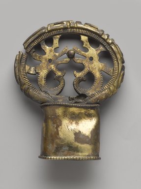  <em>Sword Pommel</em>, circa 300 - 600 C.E. Gold plated bronze, 4 5/16 x 3 9/16 in. (11 x 9 cm). Brooklyn Museum, Museum Expedition 1909, Purchased with funds given by Thomas T. Barr, E. LeGrand Beers, Carll H. de Silver, Herman B. Stutzer, Colonel Robert B. Woodward and the Museum Collection Fund, 09.910. Creative Commons-BY (Photo: Brooklyn Museum, 09.910_PS9.jpg)