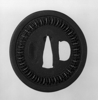  <em>Sword Guard</em>, 17th century possibly. Iron, brass, shakudo, 3 x 2 7/8 x 3/16 in. (7.6 x 7.3 x 0.5 cm). Brooklyn Museum, Museum Expedition 1909, Purchased with funds given by Thomas T. Barr, E. LeGrand Beers, Carll H. de Silver, Herman B. Stutzer, Colonel Robert B. Woodward and the Museum Collection Fund, 09.915.10. Creative Commons-BY (Photo: Brooklyn Museum, 09.915.10_front_bw.jpg)