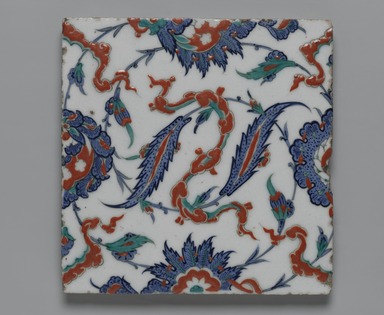  <em>Square Tile with Saz Leaves and Chinese-Inspired Cloud Bands</em>, ca. 1575. Ceramic; fritware, painted in black, cobalt blue, green, and red under a transparent glaze, 9 3/4 x 11/16 x 9 7/8 in. (24.8 x 1.7 x 25.1 cm). Brooklyn Museum, Carll H. de Silver Fund and A. Augustus Healy Fund, 11.497.1. Creative Commons-BY (Photo: Brooklyn Museum, 11.497.1_PS2.jpg)