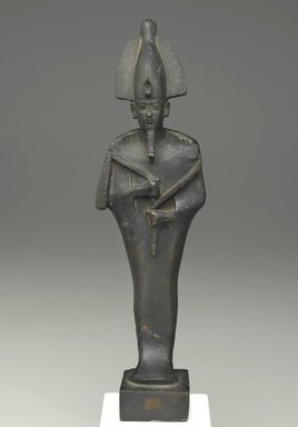  <em>Standing Mummiform Figure of Osiris</em>, 664-332 B.C.E. Bronze, 10 9/16 x 2 15/16 x 1 15/16 in. (26.8 x 7.5 x 5 cm). Brooklyn Museum, Museum Collection Fund, 11.664. Creative Commons-BY (Photo: Brooklyn Museum, 11.664_front_PS2.jpg)