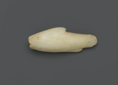  <em>Kohl Tube in the Form of a Fish</em>, ca. 1539-1292 B.C.E. Egyptian alabaster (calcite), 1 5/8 x 1 1/8 x 4 3/8 in. (4.1 x 2.9 x 11.1 cm). Brooklyn Museum, Museum Collection Fund, 11.668. Creative Commons-BY (Photo: Brooklyn Museum, 11.668_side1_PS2.jpg)