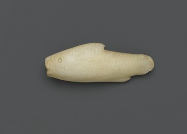  <em>Kohl Tube in the Form of a Fish</em>, ca. 1539–1292 B.C.E. Egyptian alabaster (calcite), 1 5/8 x 1 1/8 x 4 3/8 in. (4.1 x 2.9 x 11.1 cm). Brooklyn Museum, Museum Collection Fund, 11.668. Creative Commons-BY (Photo: Brooklyn Museum, 11.668_side1_PS2.jpg)