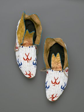 Osage. <em>Pair of Moccasins</em>, early 20th century. Hide, beads, Each: 10 13/16 x 4 5/16 in. (27.5 x 11 cm). Brooklyn Museum, Museum Expedition 1911, Museum Collection Fund, 11.694.9035a-b. Creative Commons-BY (Photo: Brooklyn Museum, 11.694.9035a-b_PS2.jpg)