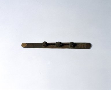 Ainu. <em>Long Straight Prayer Stick</em>. Wood, 1 1/16 x 11 9/16 in. (2.7 x 29.4 cm). Brooklyn Museum, Gift of Herman Stutzer, 12.259. Creative Commons-BY (Photo: North American Ainu Documentation Project, Yoshiburo Kotani, 1990-92, 12.259_Ainu_project.jpg)
