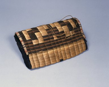 Ainu. <em>Large Oblong Mat Bag</em>. Cotton cloth, 11 3/4 x 18 15/16 in. (29.8 x 48.1 cm). Brooklyn Museum, Gift of Herman Stutzer, 12.512. Creative Commons-BY (Photo: North American Ainu Documentation Project, Yoshiburo Kotani, 1990-92, 12.512_Ainu_project.jpg)
