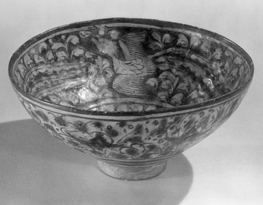  <em>Bowl with Hare and Flying Simurghs (Phoenixes)</em>, 14th century. Ceramic, "Sultanabad" ware; fritware, painted in cobalt blue and black under a transparent glaze, 3 13/16 x 8 1/4 in. (9.7 x 21 cm). Brooklyn Museum, Gift of Robert B. Woodward, 12.57. Creative Commons-BY (Photo: Brooklyn Museum, 12.57_view1_acetate_bw.jpg)