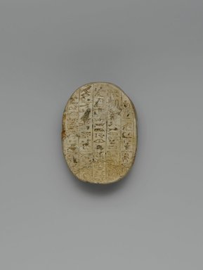 Egyptian. <em>Heart Scarab of a Priest of Hathor</em>, ca. 760–656 B.C.E. Steatite, glaze, 7/8 x 1 5/8 x 2 1/4 in. (2.2 x 4.2 x 5.7 cm). Brooklyn Museum, Gift of the Egypt Exploration Society, 12.904. Creative Commons-BY (Photo: Brooklyn Museum, 12.904_bottom_PS2.jpg)