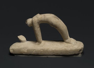  <em>Statuette of a Female Acrobat</em>, ca. 1938-1630 B.C.E. Limestone, pigment, 4 × 2 × 7 in. (10.2 × 5.1 × 17.8 cm). Brooklyn Museum, Gift of the Egypt Exploration Fund, 13.1024. Creative Commons-BY (Photo: Brooklyn Museum, 13.1024_profile_PS2.jpg)
