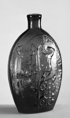  <em>Dark Green Flask Molded "Success to Railroad" and "Beer."</em> . Glass Brooklyn Museum, Purchased by Special Subscription and Museum Collection Fund, 13.1064. Creative Commons-BY (Photo: Brooklyn Museum, 13.1064_view1_acetate_bw.jpg)