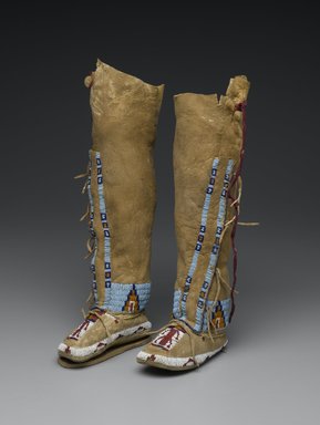 Possibly Cheyenne. <em>Child's Pair of Beaded Moccasins</em>, late 19th or early 20th century. Hide, beads, a: 14 x 2 1/2 x 6 in. (35.6 x 6.4 x 15.2 cm). Brooklyn Museum, Brooklyn Museum Collection, 13.15a-b. Creative Commons-BY (Photo: Brooklyn Museum, 13.15a-b_view2_PS2.jpg)
