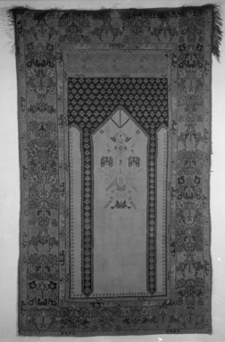  <em>Ghiordes Prayer Rug</em>, 18th–19th century. Wool, Old Dims: 77 x 46 in. (195.6 x 116.8 cm). Brooklyn Museum, Bequest of Robert B. Woodward, 15.479. Creative Commons-BY (Photo: Brooklyn Museum, 15.479_glass_bw.jpg)