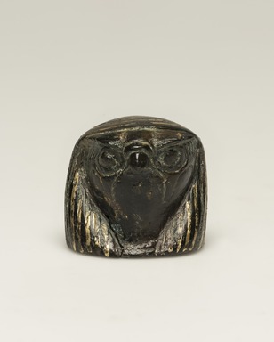  <em>Falcon Head</em>, 664-525 B.C.E., or earlier. Bronze, gold, 1 1/4 × 1 5/16 × 1 5/16 in. (3.1 × 3.3 × 3.4 cm). Brooklyn Museum, Gift of Evangeline Wilbour Blashfield, Theodora Wilbour, and Victor Wilbour honoring the wishes of their mother, Charlotte Beebe Wilbour, as a memorial to their father, Charles Edwin Wilbour, 16.107. Creative Commons-BY (Photo: Brooklyn Museum, 16.107_overall_PS11.jpg)