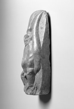 <em>Stela of Bes as a Warrior</em>, 200 B.C.E.-200 C.E. Limestone, pigment, 6 1/8 × 3 3/4 × 1/2 in. (15.6 × 9.5 × 1.3 cm). Brooklyn Museum, Gift of Evangeline Wilbour Blashfield, Theodora Wilbour, and Victor Wilbour honoring the wishes of their mother, Charlotte Beebe Wilbour, as a memorial to their father, Charles Edwin Wilbour, 16.142. Creative Commons-BY (Photo: Brooklyn Museum, 16.142_left_bw_IMLS.jpg)