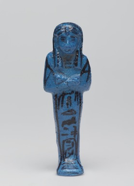  <em>Funerary Figurine of King Pinudjem I</em>, ca. 1025–1007 B.C.E. Faience, 4 5/16 × 1 3/8 × 1 in. (10.9 × 3.5 × 2.5 cm). Brooklyn Museum, Gift of Evangeline Wilbour Blashfield, Theodora Wilbour, and Victor Wilbour honoring the wishes of their mother, Charlotte Beebe Wilbour, as a memorial to their father, Charles Edwin Wilbour, 16.189. Creative Commons-BY (Photo: , 16.189_front_PS9.jpg)