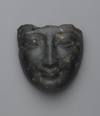  <em>Face from a Sarcophagus Cover</em>, ca. 1539–1400 B.C.E. Granite, 6 5/8 × 6 1/2 × 3 3/8 in. (16.8 × 16.5 × 8.6 cm). Brooklyn Museum, Gift of Evangeline Wilbour Blashfield, Theodora Wilbour, and Victor Wilbour honoring the wishes of their mother, Charlotte Beebe Wilbour, as a memorial to their father, Charles Edwin Wilbour, 16.207. Creative Commons-BY (Photo: Brooklyn Museum, 16.207_PS2.jpg)