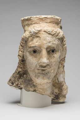 Graeco-Egyptian. <em>Female Head</em>, 1st century B.C.E.–1st century C.E. Limestone, stone, pigment, 14 x 10 1/4 in. (35.5 x 26 cm). Brooklyn Museum, Gift of Evangeline Wilbour Blashfield, Theodora Wilbour, and Victor Wilbour honoring the wishes of their mother, Charlotte Beebe Wilbour, as a memorial to their father, Charles Edwin Wilbour, 16.236. Creative Commons-BY (Photo: Brooklyn Museum, 16.236_overall_at_PS11.jpg)