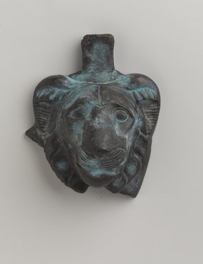 Graeco-Egyptian. <em>Lion Head</em>, 4th-3rd century B.C.E. Bronze, 2 11/16 x 2 1/4 in. (6.9 x 5.7 cm). Brooklyn Museum, Gift of Evangeline Wilbour Blashfield, Theodora Wilbour, and Victor Wilbour honoring the wishes of their mother, Charlotte Beebe Wilbour, as a memorial to their father, Charles Edwin Wilbour, 16.259. Creative Commons-BY (Photo: Brooklyn Museum, 16.259_PS9.jpg)