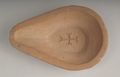 Coptic. <em>Mold for a Lamp</em>, 5th century C.E. Terracotta, 7/8 x 3 3/8 x 5 1/16 in. (2.3 x 8.5 x 12.8 cm). Brooklyn Museum, Gift of Evangeline Wilbour Blashfield, Theodora Wilbour, and Victor Wilbour honoring the wishes of their mother, Charlotte Beebe Wilbour, as a memorial to their father, Charles Edwin Wilbour, 16.284. Creative Commons-BY (Photo: Brooklyn Museum, 16.284_top.jpg)