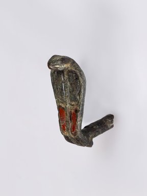  <em>Uraeus</em>, 664–30 B.C.E. Bronze, 1 9/16 x 11/16 x 1 1/4 in. (4 x 1.8 x 3.2 cm). Brooklyn Museum, Gift of Evangeline Wilbour Blashfield, Theodora Wilbour, and Victor Wilbour honoring the wishes of their mother, Charlotte Beebe Wilbour, as a memorial to their father, Charles Edwin Wilbour, 16.580.181. Creative Commons-BY (Photo: Brooklyn Museum (Gavin Ashworth,er), 16.580.181_Gavin_Ashworth_photograph.jpg)