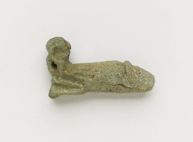 <em>Small Figure of Kneeling, Aged Man as Amulet</em>, 30 B.C.E.-395 C.E. Faience, 9/16 x 1 in. (1.5 x 2.6 cm). Brooklyn Museum, Gift of Evangeline Wilbour Blashfield, Theodora Wilbour, and Victor Wilbour honoring the wishes of their mother, Charlotte Beebe Wilbour, as a memorial to their father Charles Edwin Wilbour, 16.580.18. Creative Commons-BY (Photo: Brooklyn Museum, 16.580.18_PS4.jpg)