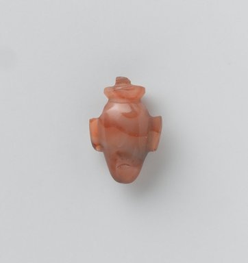  <em>Heart Amulet</em>, 664-343 B.C.E. Carnelian, 9/16 x 3/8 x 7/8 in. (1.5 x 0.9 x 2.2 cm). Brooklyn Museum, Gift of Evangeline Wilbour Blashfield, Theodora Wilbour, and Victor Wilbour honoring the wishes of their mother, Charlotte Beebe Wilbour, as a memorial to their father Charles Edwin Wilbour, 16.580.31. Creative Commons-BY (Photo: Brooklyn Museum, 16.580.31_front_PS2.jpg)