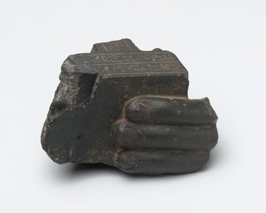  <em>Fragment of a Left Hand</em>, 285-246 B.C. Basalt, 4 7/16 x 4 7/16 in. (11.2 x 11.2 cm). Brooklyn Museum, Gift of Evangeline Wilbour Blashfield, Theodora Wilbour, and Victor Wilbour honoring the wishes of their mother, Charlotte Beebe Wilbour, as a memorial to their father, Charles Edwin Wilbour, 16.620. Creative Commons-BY (Photo: Brooklyn Museum, 16.620_front_PS2.jpg)