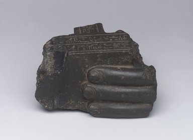 <em>Fragment of a Left Hand</em>, 285-246 B.C. Basalt, 4 7/16 x 4 7/16 in. (11.2 x 11.2 cm). Brooklyn Museum, Gift of Evangeline Wilbour Blashfield, Theodora Wilbour, and Victor Wilbour honoring the wishes of their mother, Charlotte Beebe Wilbour, as a memorial to their father, Charles Edwin Wilbour, 16.620. Creative Commons-BY (Photo: Brooklyn Museum, 16.620_view3.jpg)