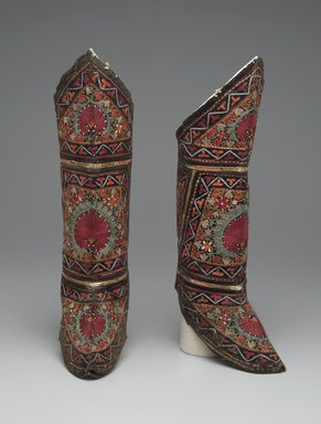  <em>Pair of Boots</em>, 20th century. Black velvet and green leather, with polychrome embroidery, 17 x 9 in. (43.2 x 22.9 cm). Brooklyn Museum, Frederick Loeser Fund, 18.176. Creative Commons-BY (Photo: Brooklyn Museum, 18.176_front_PS2.jpg)