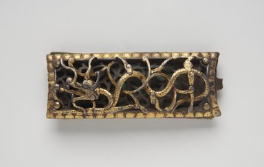  <em>Iron Fitting with Dragon Decoration</em>, ca. 15th century. Iron, gilt, leather, 3 1/2 x 1 3/8in. (8.9 x 3.5cm). Brooklyn Museum, Gift of Georgia and Michael de Havenon, 1989.176.3. Creative Commons-BY (Photo: Brooklyn Museum, 1989.176.3_PS11.jpg)