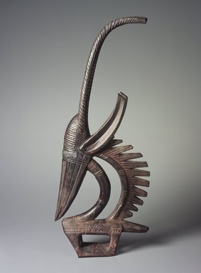 Bamana. <em>Dance Headdress (Ci-wara)</em>, late 19th or early 20th century. Wood, metal, ferrous nails, accumulated material, 28 1/2 x 12 x 2 3/4 in. (72.4 x 30.5 x 7 cm). Brooklyn Museum, The Adolph and Esther D. Gottlieb Collection, 1989.51.14. Creative Commons-BY (Photo: Brooklyn Museum, 1989.51.14.jpg)