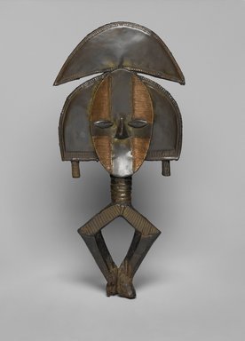 Kota. <em>Reliquary Guardian Figure (Mbulu Ngulu)</em>, late 19th century. Wood, copper, brass, 20 1/4 x 8 3/4 x 2 1/4in. (51.4 x 22.2 x 5.7cm). Brooklyn Museum, The Adolph and Esther D. Gottlieb Collection, 1989.51.2. Creative Commons-BY (Photo: Brooklyn Museum, 1989.51.2_PS2.jpg)