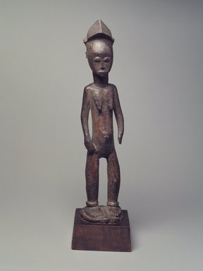 Baule. <em>Female Figure (Blolo Bla)</em>, 20th century. Wood, 18 1/8 x 3 x 4 in. Brooklyn Museum, The Adolph and Esther D. Gottlieb Collection, 1989.51.47. Creative Commons-BY (Photo: Brooklyn Museum, 1989.51.47.jpg)