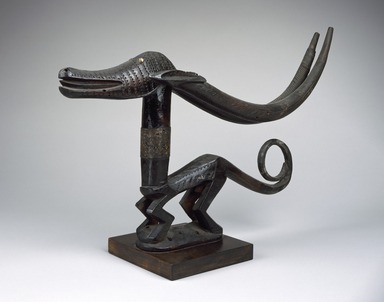 Bamana. <em>Headdress (Ci-wara Kun)</em>, 20th century. Wood, metal, pigment, 11 x 22 1/4 x 2 1/2in. (27.9 x 56.5 x 6.4cm). Brooklyn Museum, The Adolph and Esther D. Gottlieb Collection, 1989.51.51. Creative Commons-BY (Photo: Brooklyn Museum, 1989.51.51_SL3.jpg)