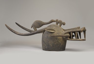 Senufo. <em>Mask (Kponyugu)</em>, late 19th or early 20th century. Wood, 14 x 36 1/2 x 11 in. (35.6 x 92.7 x 27.9 cm). Brooklyn Museum, Gift of Eugene and Harriet Becker, 1990.220. Creative Commons-BY (Photo: Brooklyn Museum, 1990.220_threequarter_PS9.jpg)