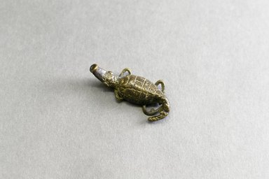 Akan. <em>Gold-weight (abrammuo): crocodile</em>, ca. 1700-1900. Copper alloy, length: 3 in. (length: 4.4 cm). Brooklyn Museum, Gift of Shirley B. Williams, 1990.221.29. Creative Commons-BY (Photo: Brooklyn Museum, 1990.221.29_front_PS5.jpg)