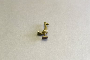 Akan. <em>Gold-weight (abrammuo): bird</em>, 19th century. Copper alloy, length: 3 in. (length: 4.5 cm). Brooklyn Museum, Gift of Shirley B. Williams, 1990.221.32. Creative Commons-BY (Photo: Brooklyn Museum, 1990.221.32_front_PS5.jpg)