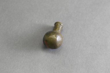 Akan. <em>Gold-weight (abrammuo): pot</em>, 19th century. Copper alloy, length: 3 in. (length: 4.4 cm. Brooklyn Museum, Gift of Shirley B. Williams, 1990.221.33. Creative Commons-BY (Photo: Brooklyn Museum, 1990.221.33_PS5.jpg)