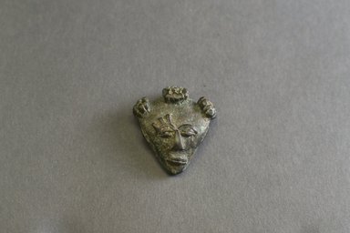 Akan. <em>Gold-weight (abrammuo): head</em>, 19th century. Copper alloy, length: 3 in. (length: 4.5 cm. Brooklyn Museum, Gift of Shirley B. Williams, 1990.221.40. Creative Commons-BY (Photo: Brooklyn Museum, 1990.221.40_front_PS5.jpg)