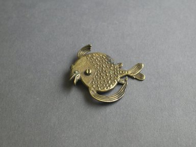 Akan. <em>Gold-weight (abrammuo): fish</em>, 1700-1900. Copper alloy, length: 3 in. (length: 5.7 cm. Brooklyn Museum, Gift of Shirley B. Williams, 1990.221.54. Creative Commons-BY (Photo: Brooklyn Museum, 1990.221.54_PS5.jpg)