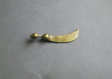 Akan. <em>Gold-weight (abrammuo): sword</em>, ca. 1700-1900. Copper alloy, length: 3 in. (length: 7.2 cm). Brooklyn Museum, Gift of Shirley B. Williams, 1990.221.56. Creative Commons-BY (Photo: Brooklyn Museum, 1990.221.56_front_PS5.jpg)