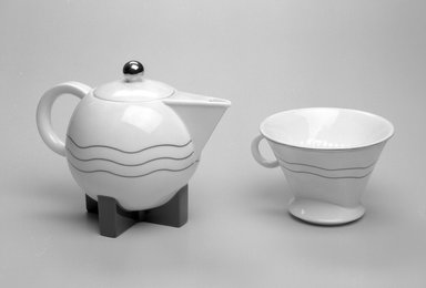 Michael Graves (American, 1934-2015). <em>Coffee Pot with Lid and Drip Spout</em>, Designed 1987; Manufactured 1989-1990. Porcelain, Coffee Pot & Lid (a & b): 7 x 9 1/4 x 5 3/4 in. (17.8 x 23.5 x 14.6 cm). Brooklyn Museum, Gift of Swid Powell, 1990.34.1a-c. Creative Commons-BY (Photo: Brooklyn Museum, 1990.34.1a-c_view1_bw.jpg)