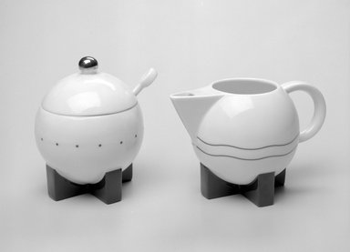 Michael Graves (American, 1934-2015). <em>Creamer</em>, Designed 1987; Manufactured 1989-1990. Porcelain, 3 7/16 x 5 5/8 x 3 7/16in. (8.7 x 14.3 x 8.7cm). Brooklyn Museum, Gift of Swid Powell, 1990.34.2. Creative Commons-BY (Photo: , 1990.34.2_1990.34.3a-c_bw.jpg)