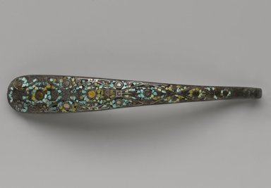  <em>Garment Hook</em>, 475-221 B.C.E. Bronze, inlaid with turquoise, silver, and gold, 1 1/2 × 1 1/4 × 7 1/2 in. (3.8 × 3.2 × 19.1 cm). Brooklyn Museum, Gift of Alan and Simone Hartman, 1991.127.6. Creative Commons-BY (Photo: Brooklyn Museum, 1991.127.6_top_PS4.jpg)
